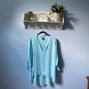 Excellent used condition blouse; worn once; very flattering